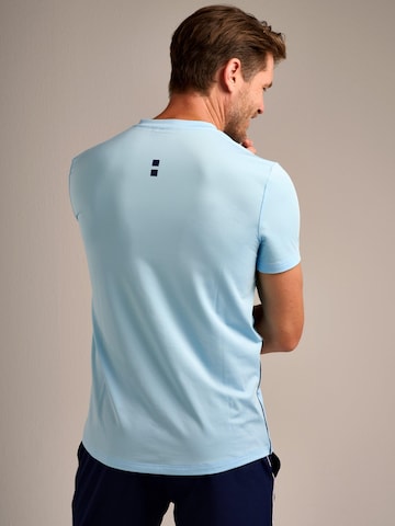 nordicdots Performance Shirt 'Performance V-Tee' in Blue