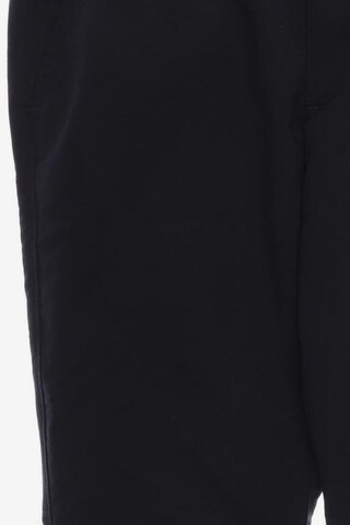 UNDER ARMOUR Pants in 34 in Black
