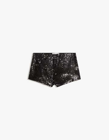 Bershka Slim fit Trousers in Black: front