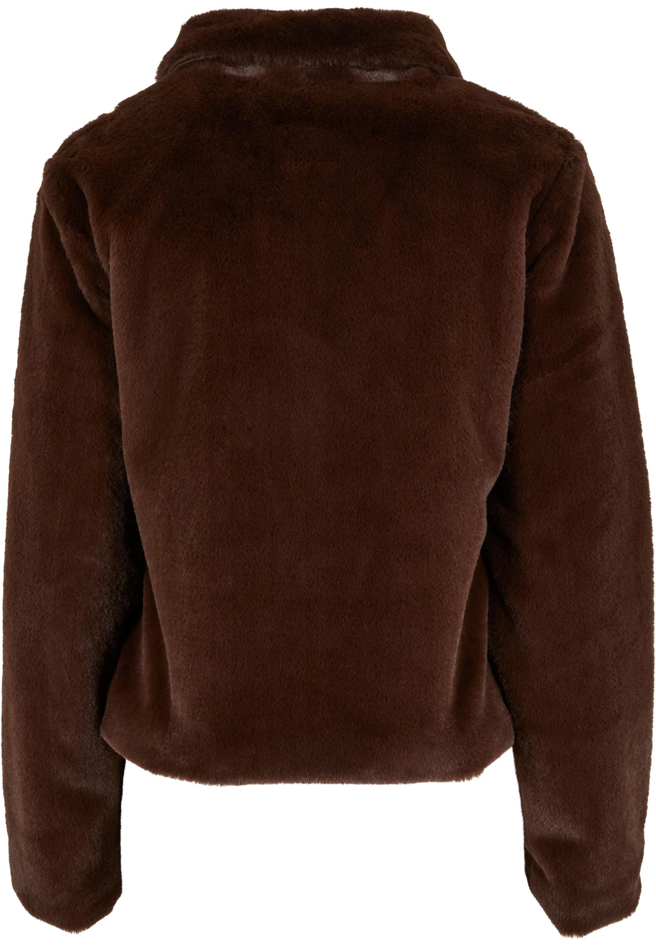 Karl Kani Tussenjas in Bruin