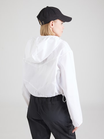 Nike Sportswear Prehodna jakna | bela barva