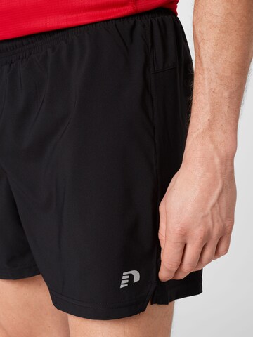 Regular Pantalon de sport Newline en noir