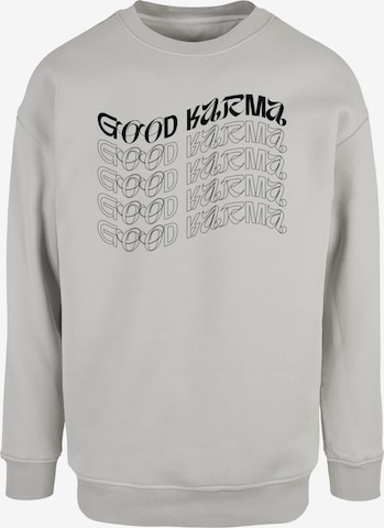 Merchcode Sweatshirt 'Good Karma' in Grey: front