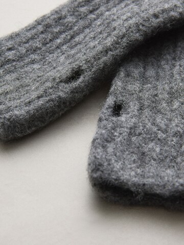 Next Handledsvärmare i grå