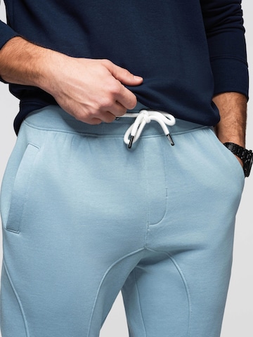 Effilé Pantalon de sport Ombre en bleu