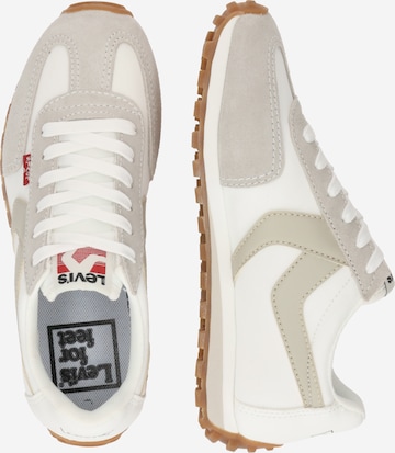 LEVI'S ® Låg sneaker 'STRYDER RED TAB' i vit
