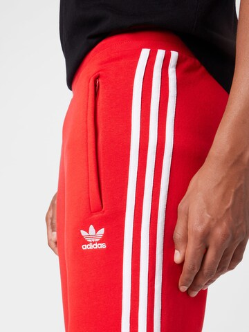 ADIDAS ORIGINALS Конический (Tapered) Штаны в Красный