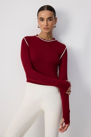 T-shirt Touche Prive en rouge : devant