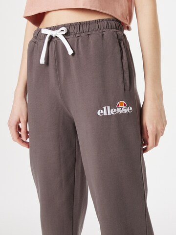 ELLESSE Loosefit Housut 'Taran' värissä ruskea