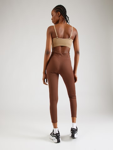 Reebok - Skinny Pantalón deportivo 'STUDIO' en marrón