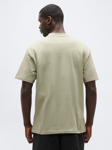 T-Shirt fonctionnel NIKE en vert
