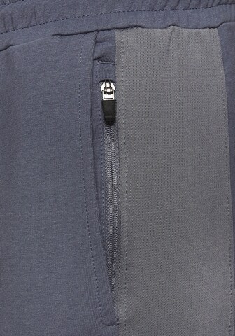 Authentic Le Jogger Tapered Pants in Blue