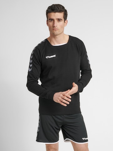 Sweat de sport Hummel en noir : devant