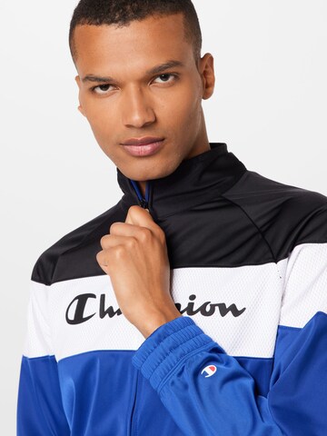 Champion Authentic Athletic Apparel Tracksuit in Blue