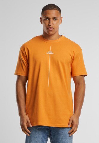 Merchcode Shirt 'Think Different' in Orange: front