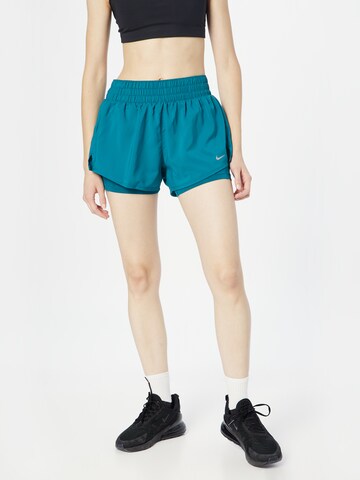 Regular Pantalon de sport NIKE en vert : devant