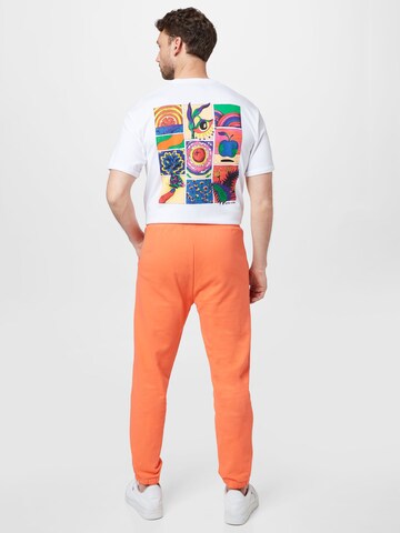 SCOTCH & SODA Tapered Trousers in Orange