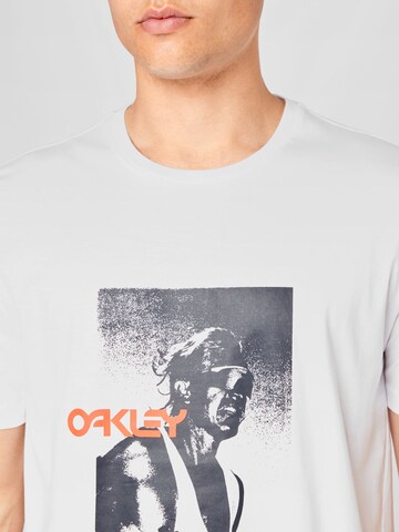 OAKLEY - Camiseta funcional 'Scott Tinley' en blanco