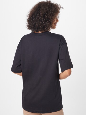 Tricou de la Champion Reverse Weave pe negru