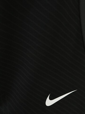 NIKE Slimfit Spodnie sportowe w kolorze czarny