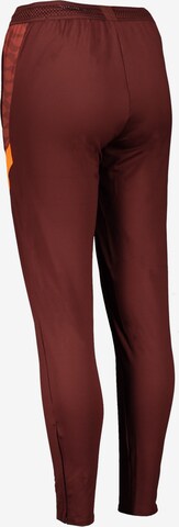 NIKE Slim fit Workout Pants in Brown