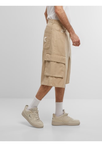 Loosefit Pantalon Karl Kani en beige