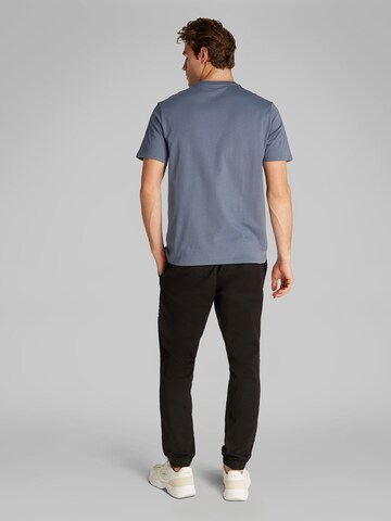 Maglietta di Calvin Klein Jeans in grigio