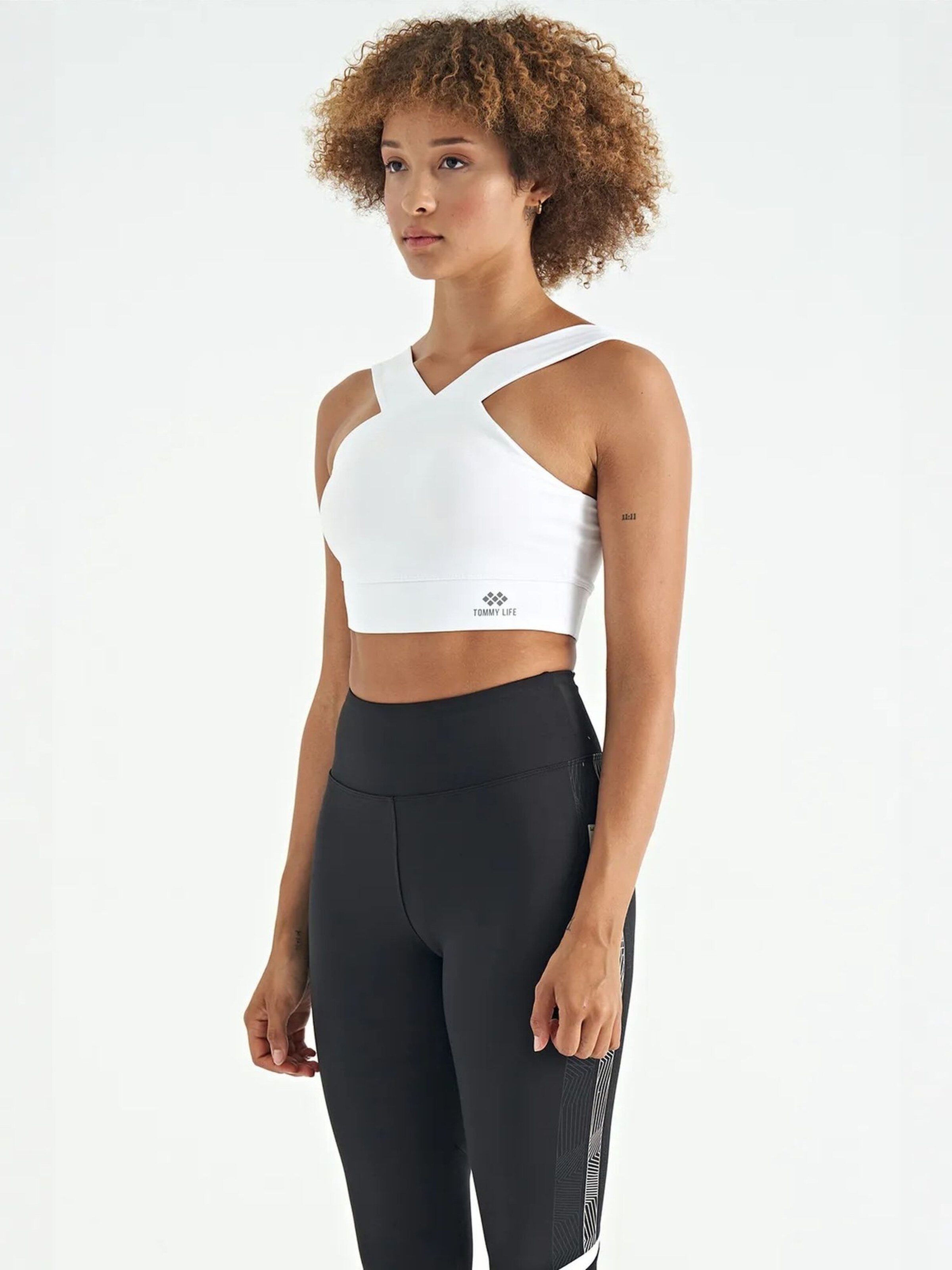 Top sportivo di Tommy Life in bianco
