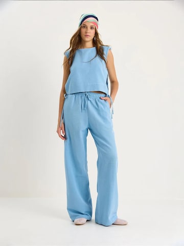 Bianco Lucci - Calças de fato em azul: frente