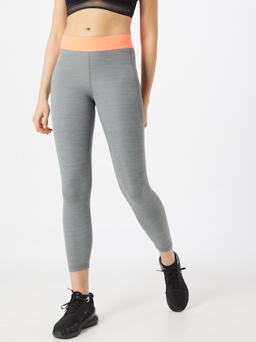 NIKE Skinny Sports trousers in Grey: front