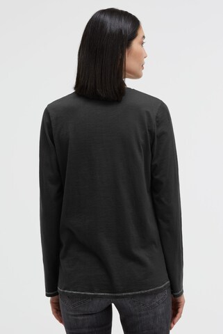 Soccx Langarmshirt mit Print und Schmucksteinen in Schwarz