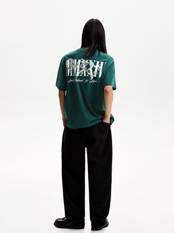Bershka T-Shirt in Grün