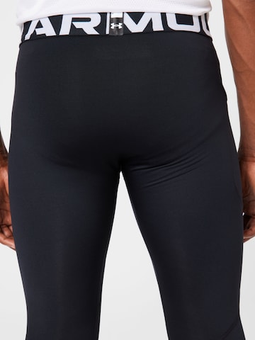 UNDER ARMOUR Skinny Sports trousers in Black