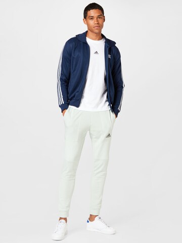 ADIDAS SPORTSWEAR Slimfit Sportsbukser 'Essentials Brandlove French Terry' i grønn