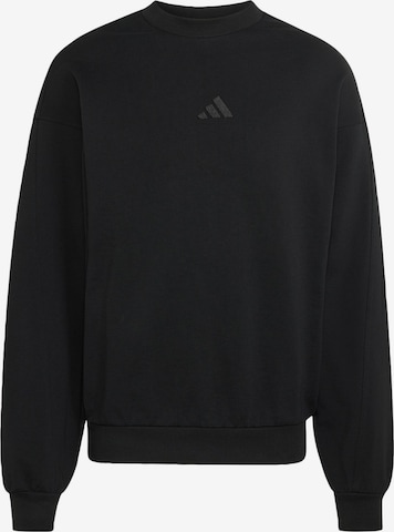 ADIDAS SPORTSWEAR - Camiseta deportiva en negro: frente