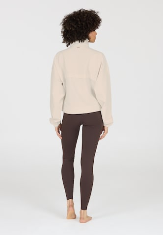 Athlecia Performance shirt 'Carley' in Beige