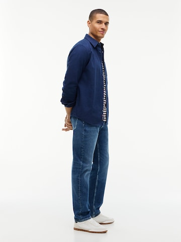 Coupe slim Jean 'Ryan' Tommy Jeans en bleu