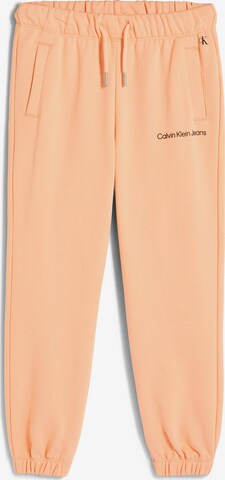 Calvin Klein Jeans Pants in Orange: front