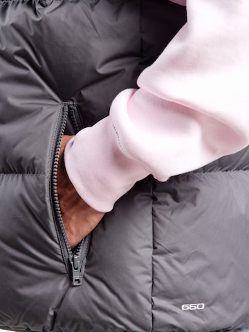 Gilet 'CLUB' Nike Sportswear en gris