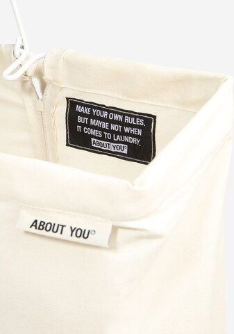 ABOUT YOU Laundry basket in Beige