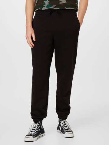 Effilé Pantalon 'Jake' ABOUT YOU en noir : devant