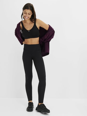 bonprix Skinny Sporthose in Schwarz