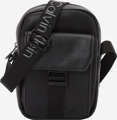 Rankinė su ilgu dirželiu iš Calvin Klein, spalva – juoda, Prekių apžvalga