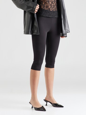 Skinny Leggings Monki en noir : devant