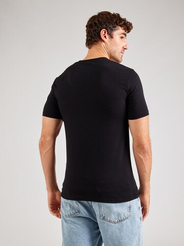 Tricou 'Ollio' de la ELLESSE pe negru