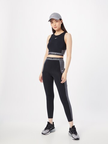 NIKE Skinny Sporthose in Schwarz