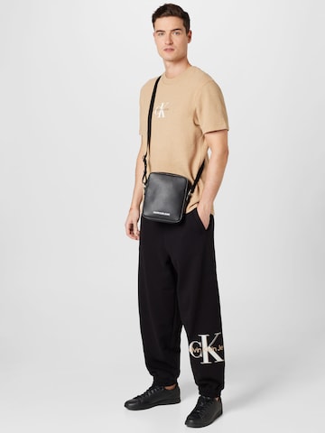 Calvin Klein Jeans Zúžený Kalhoty 'Archival' – černá