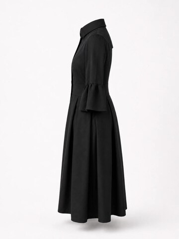 BIBI SAKALIEVA Jurk 'Black Open-Back Midi Dress with Bell Sleeves' in Zwart