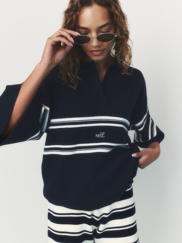 Pull-over self. en bleu