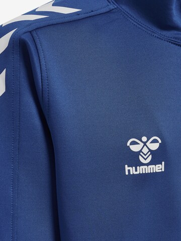 Veste de survêtement 'Core Xk Poly' Hummel en bleu